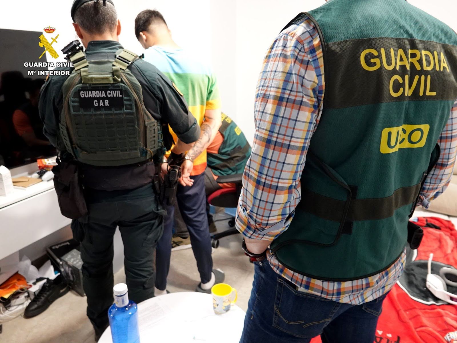 Suspects detained by law enforcement authorities in Spain. Image credit: Guardia Civil.