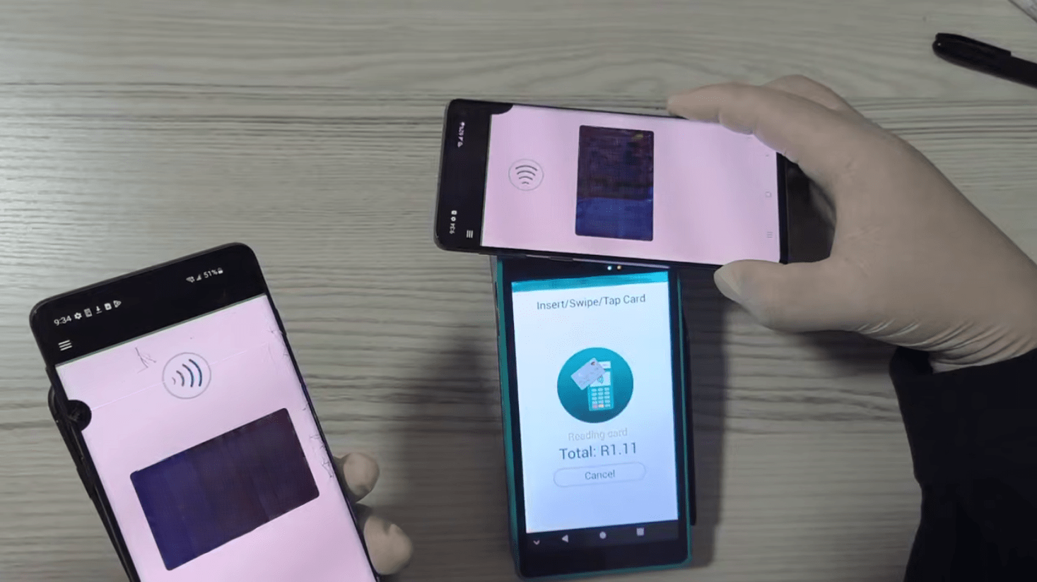 Figure 4e. X-NFC Tapper used with a POS terminal Figure 4e. X-NFC Tapper used with a POS terminal